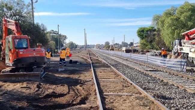 A file photo of excavators on rail track. Nobody was injured in the early morning incident on track between Thorneside and Birkdale train stations in March 2020 but the Australian Transport Safety Bureau report is still pending.