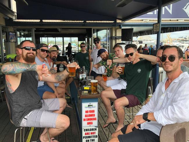 Staff from All About Cabinets, Coomera pictured last year after their planned Christmas party at McLaren's Landing was cancelled. Photo: Michael Saunders.