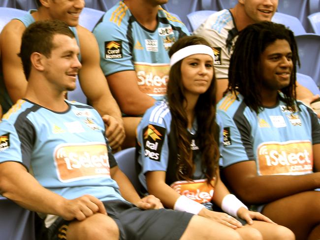 Amy Shark with Titans players during her time at the club.