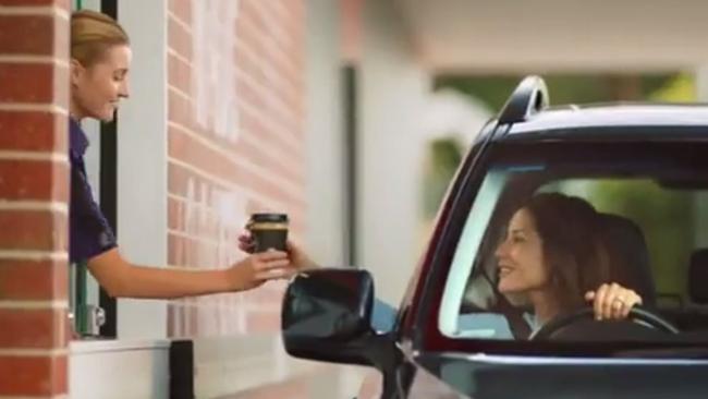 A woman received her barista made coffee in the TV ad.