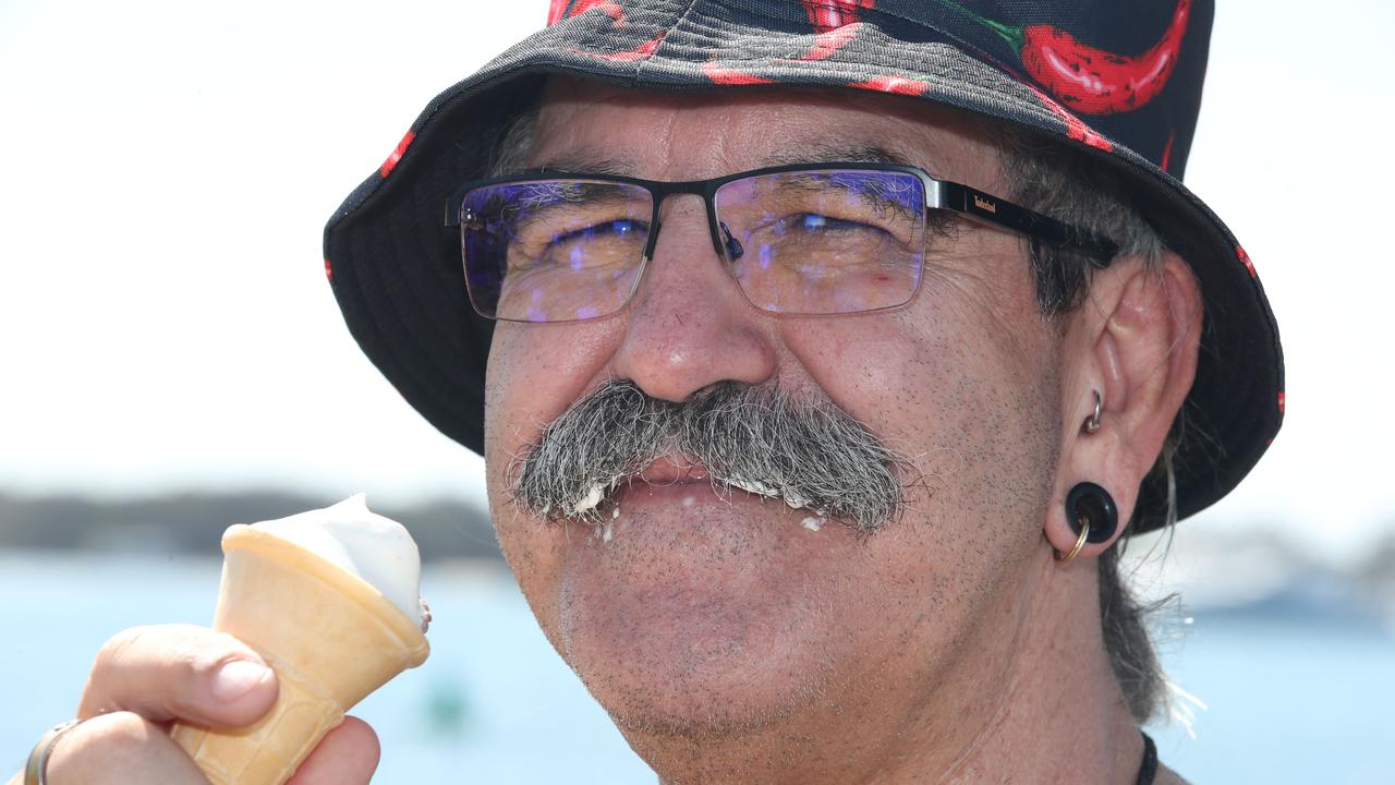 Huge crowds for the first day of the Gold Coast Show. John Loveridge enjoys his ice cream, and it shows. Picture: Glenn Hampson