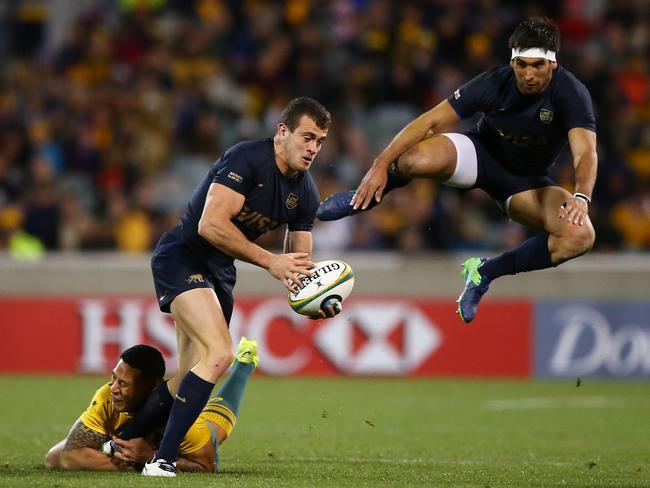 CANBERRA, AUSTRALIA - SEPTEMBER 16:  Emiliano Boffelli of Argentina is tackled as Matias Orlando of Argentina leaps into the air during The Rugby Championship match between the Australian Wallabies and the Argentina Pumas at Canberra Stadium on September 16, 2017 in Canberra, Australia.  (Photo by Mark Nolan/Getty Images)