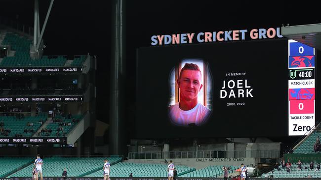 Players stood for a minutes silence in memory of Joel Dark, before the round 18 NRL match between the Sydney Roosters and the Newcastle Knights at the Sydney Cricket Ground on September 12 (Photo by Cameron Spencer/Getty Images)