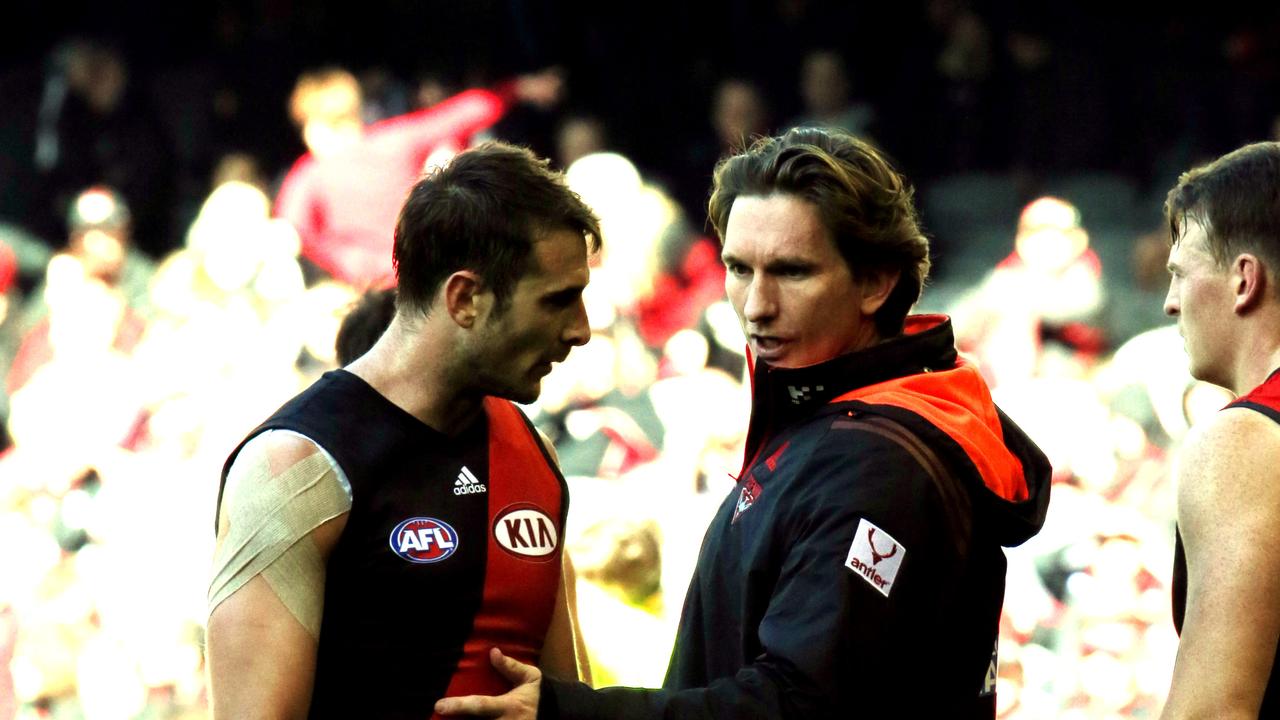 MELBOURNE, AUSTRALIA - AUGUST 11: Round 20: Essendon V West Coast Eagles at Etihad Stadium, Essendon coach James Hird talks with Jobe Watson