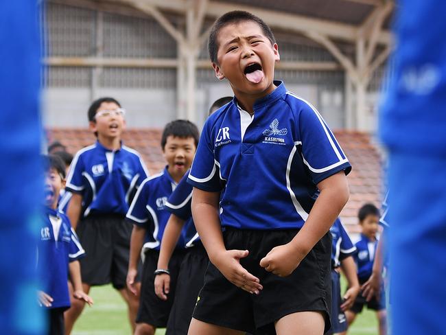 School children perform their own version of the haka for the visiting New Zealand's players in Kashiwa, Japan last week.