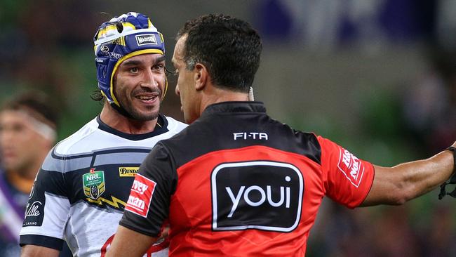 Johnathan Thurston of the Cowboys in discussion with the referee during the Round 3 NRL match between the Melbourne Storm and the North Queensland Cowboys at AAMI Park in Melbourne, Thursday, March 22, 2018. (AAP Image/Hamish Blair) NO ARCHIVING, EDITORIAL USE ONLY