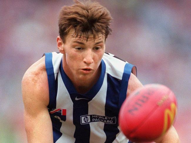 19Apr98 North Melbourne v Brisbane Lions. Brent Harvey battles Nick Trask. a/ct /Football