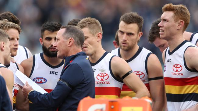 Adelaide coach Don Pyke talks with his players during the Round 19 loss to Carlton. Picture: AAP Image/David Crosling