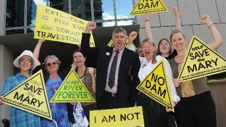 Tanzi Smith (third from left) and Glenda Pickersgill (third from right) with supporters celebrate at the Federal Court in Brisbane following the decision to cancel the Traveston Dam project.