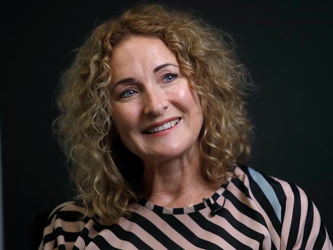 This photo taken on August 6, 2020 shows New Zealand media mogul Sinead Boucher posing at the headquarters of Stuff media in Wellington. - Tucked away in Sinead Boucher's sock drawer is the one-dollar coin that transformed the former journalist into New Zealand's biggest media mogul, giving her a platform to challenge Facebook and other social media giants. (Photo by Marty MELVILLE / AFP) / TO GO WITH AFP STORY HEALTH-PANDEMIC-NZEALAND-MEDIA-INTERNET-BOUCHER,INTERVIEW BY NEIL SANDS