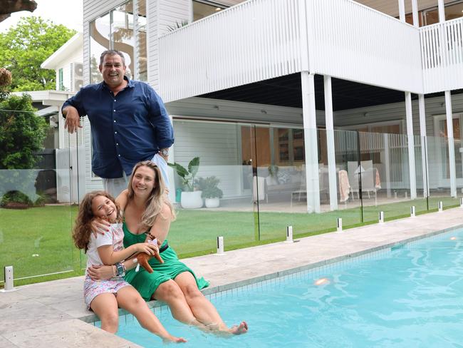 11/12/2024: Proptrak data revealing the hottest real estate suburbs which include Clayfield in Brisbane. Kieren Maddern (woman) and Matthew Willams, with their daughter Vesper, 8. PIC: Mackenzie Scott