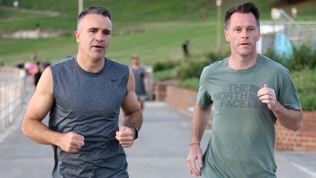 Minns and Premier of South Australia Peter Malinauskas go for a run at Bondi Beach. Picture: Damian Shaw