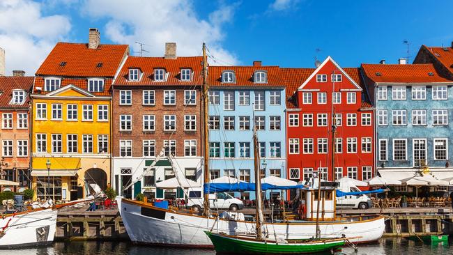 Scenic summer view of color buildings of Nyhavn in Copehnagen.