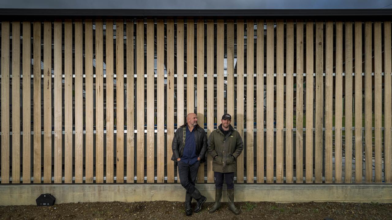 Farm owner Nick Haddow and manager Richard Butler at the dairy. Picture: Phillip Biggs