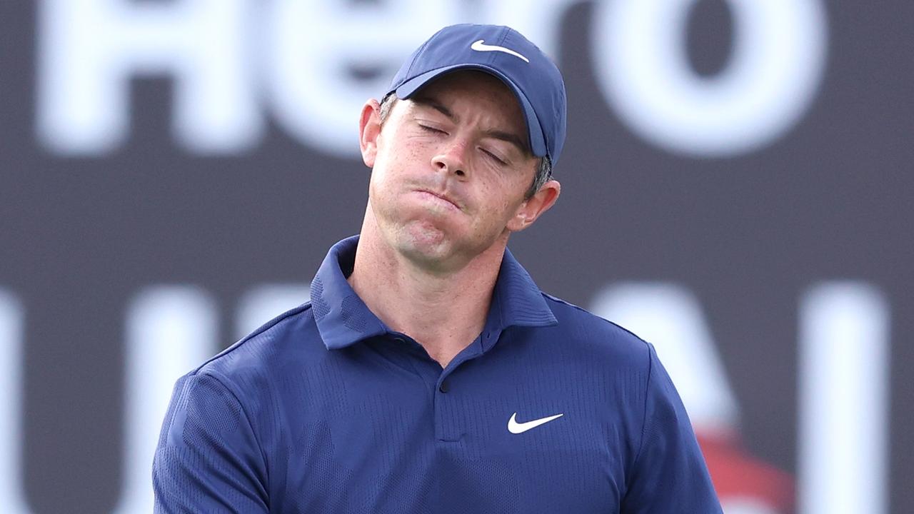 DUBAI, UNITED ARAB EMIRATES - JANUARY 28: Rory McIlroy of Northern Ireland reacts on the 18th green during the continuation of Round Two on Day Three of the Hero Dubai Desert Classic at Emirates Golf Club on January 28, 2023 in Dubai, United Arab Emirates. (Photo by Warren Little/Getty Images)