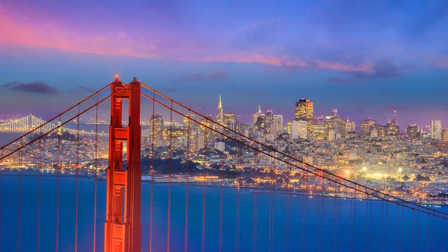 ESCAPE: Golden Gate Bridge and downtown San Francisco at twilight Picture: iStock