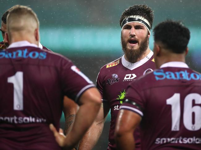 Liam Wright (centre) will again share the Queensland Reds captaincy with Tate McDermott. Picture: Cameron Spencer/Getty Images