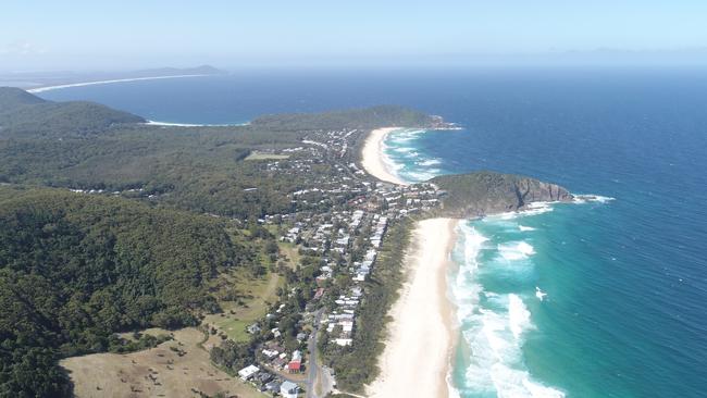 The property is located 250km north of Sydney and is close to a ribbon of beaches.