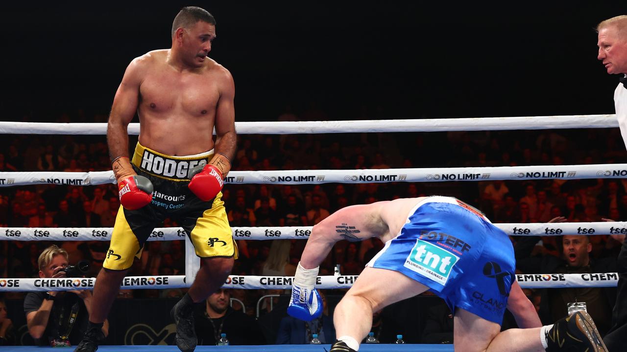 BRISBANE, AUSTRALIA – SEPTEMBER 15: Justin Hodges knocks down Paul Gallen during their bout at Nissan Arena on September 15, 2022 in Brisbane, Australia. (Photo by Chris Hyde/Getty Images)
