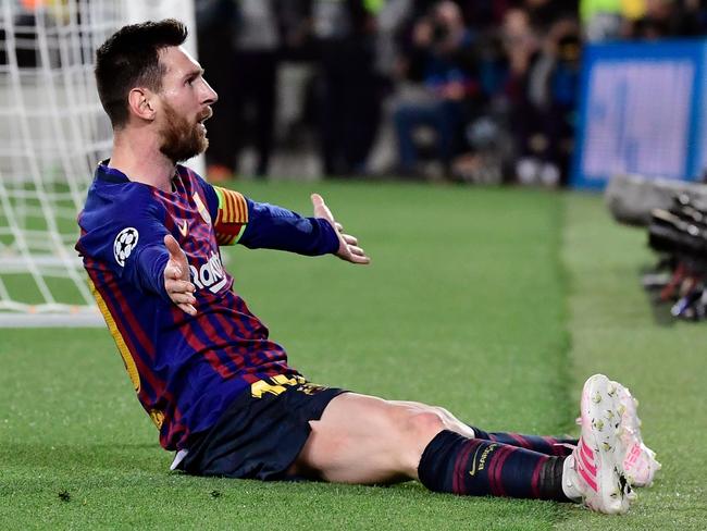 Barcelona's Argentinian forward Lionel Messi celebrates after scoring his team's third goal during the UEFA Champions League semi-final first leg football match between Barcelona and Liverpool at the Camp Nou Stadium in Barcelona on May 1, 2019. (Photo by JAVIER SORIANO / AFP)