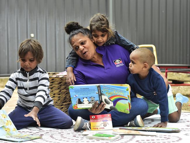 Congress Early Childhood Educator Browyn Feilding with Elijih Arabie ,4, (no hair), Ethel Impu ,3, (girl), and Tayshaun Haines ,4, (stripey shirt) at the Pre-School Readiness Program, Alice Springs.