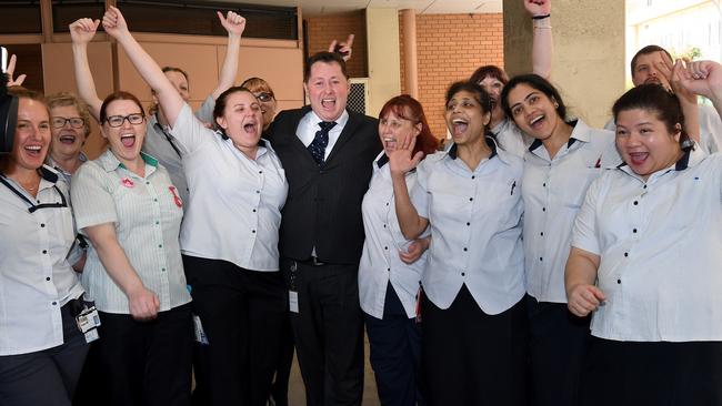 Health Minister Jack Snelling celebrates nurses from the vascular ward as the final patient leaves the old RAH. Picture: Naomi Jellicoe