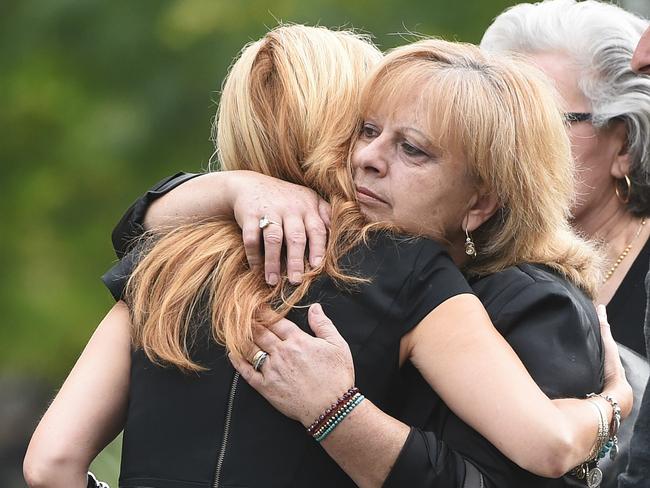 Mourners arrive for the Funeral of slain underworld lawyer Joe Acquaro at St. Mary's Star of the Sea in West Melbourne. Picture: Jake Nowakowski