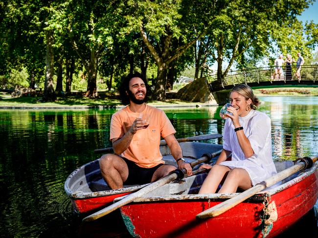 Hot Weather - Refreshment Island - Rymill Park Lake, event organiser Mark Kamelh with Lizzy Shannon (in boats) and Nick Stock (bald), Biff Burnette with Hamish Tregeale (on bridge) Friday January 22, 2021 - pic Mike Burton - PLEASE NOTE YOU CAN NOT GO ON WATER AT THIS EVENT