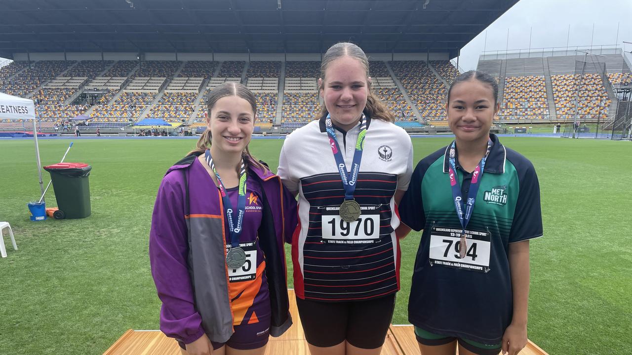 Wide Bay's Chloe Gibson, middle, flanked by Paradise Tuua and Jessica Heap.