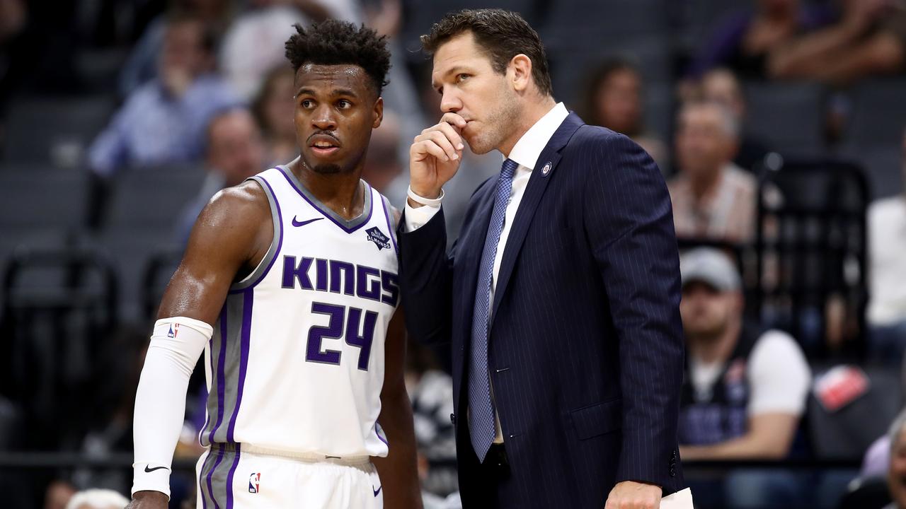 Buddy Hield and head coach Luke Walton.