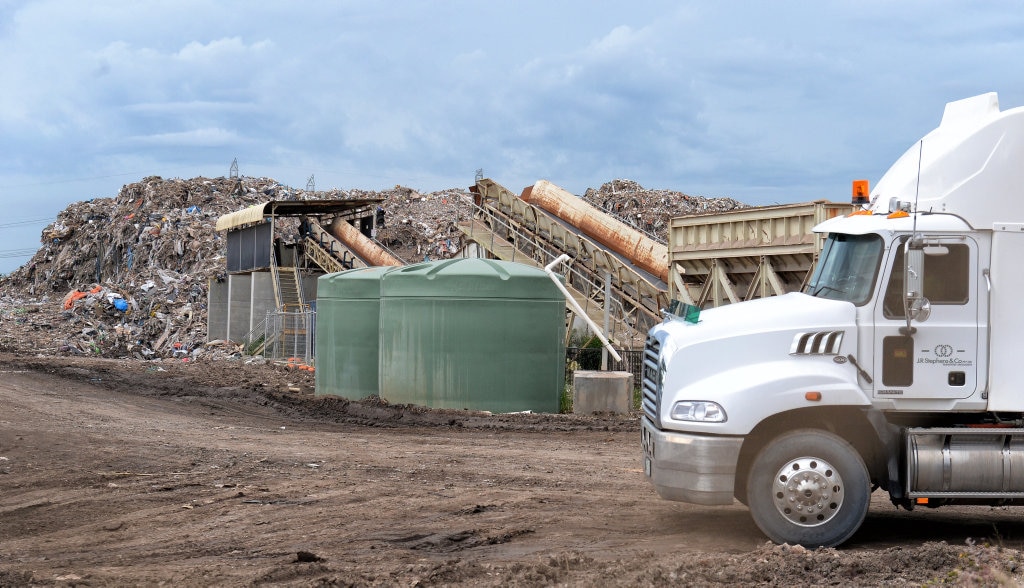 Huge rubbish pile building next to Ipswich suburb | The Courier Mail