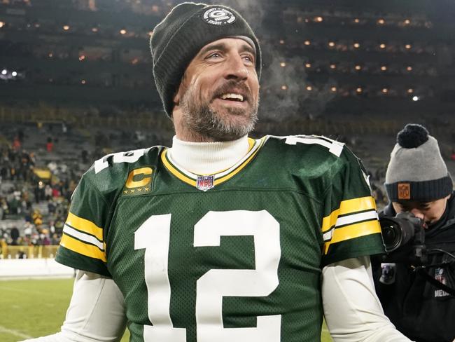 GREEN BAY, WISCONSIN - DECEMBER 19: Aaron Rodgers #12 of the Green Bay Packers reacts after defeating the Los Angeles Rams 24-12 at Lambeau Field on December 19, 2022 in Green Bay, Wisconsin. (Photo by Patrick McDermott/Getty Images)