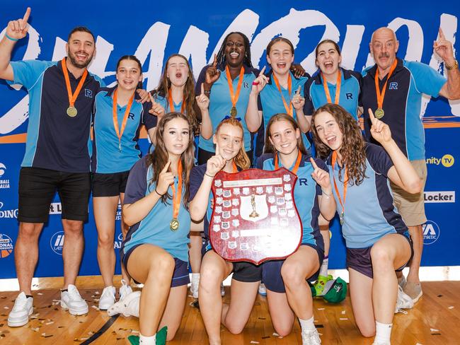 Ex-NBL players Adam Gibson (left) and Dean Kinsman (right) with the Rowville Championship girls during the 2023 Basketball Australia Schools Championships Picture: Taylor Earnshaw