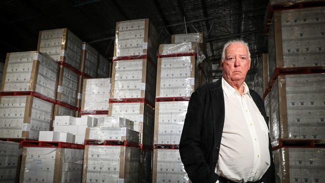 Howard Park Wines owner Jeff Burch in a warehouse full of wine that was destined for China. Picture: Colin Murty