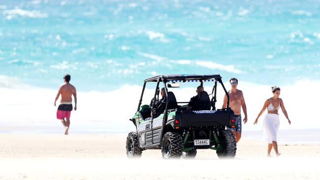 People still hit the beaches on the Gold Coast over Easter. Picture: NIGEL HALLETT