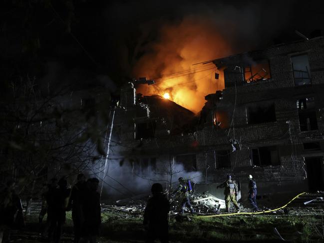 Emergency personnel work at the site of a residential building destroyed by a Russian strike in Zaporizhzhia, Ukraine, on Thursday, May 1, 2025. Picture: AP Photo/Kateryna Klochko