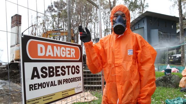 Removing asbestos is a dangerous task. PHOTO: FILE