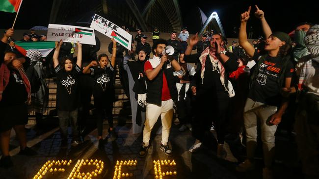 Palestine supporters rally outside the Sydney Opera House on Monday night. Picture: Getty Images