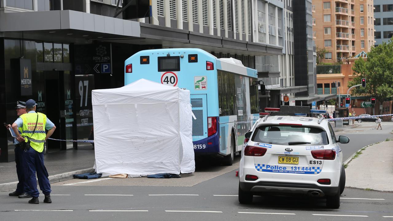 Pictured is the scene on Grafton Street at Bondi Junction where a woman in her 20s has been struck and killed by a bus. Picture: Richard Dobson