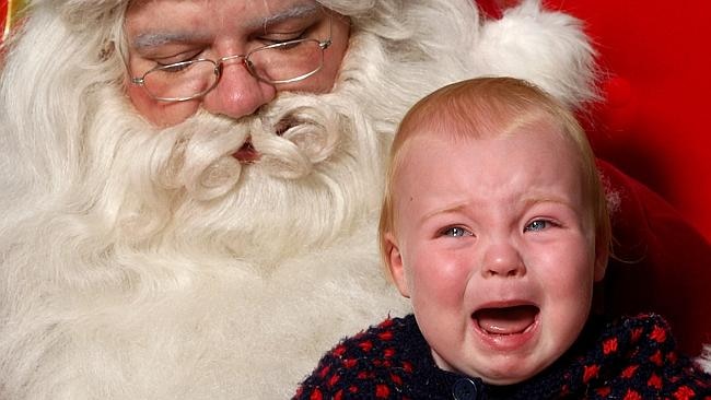 Santa baby: St Nick’s in town but not everyone is jolly | Herald Sun