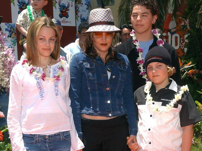 Lisa Marie Presley and her children Benjamin Keough (front right), Riley Keough and her half-brother Navarone Garibaldi. Picture: AFP