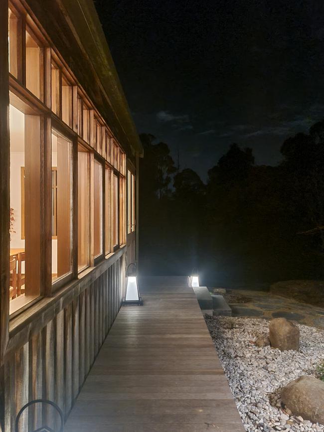 Lanterns which are dotted around Provider House in Lenah Valley, which light the cabin’s exterior at night are a lovely touch: Picture: Amber Wilson