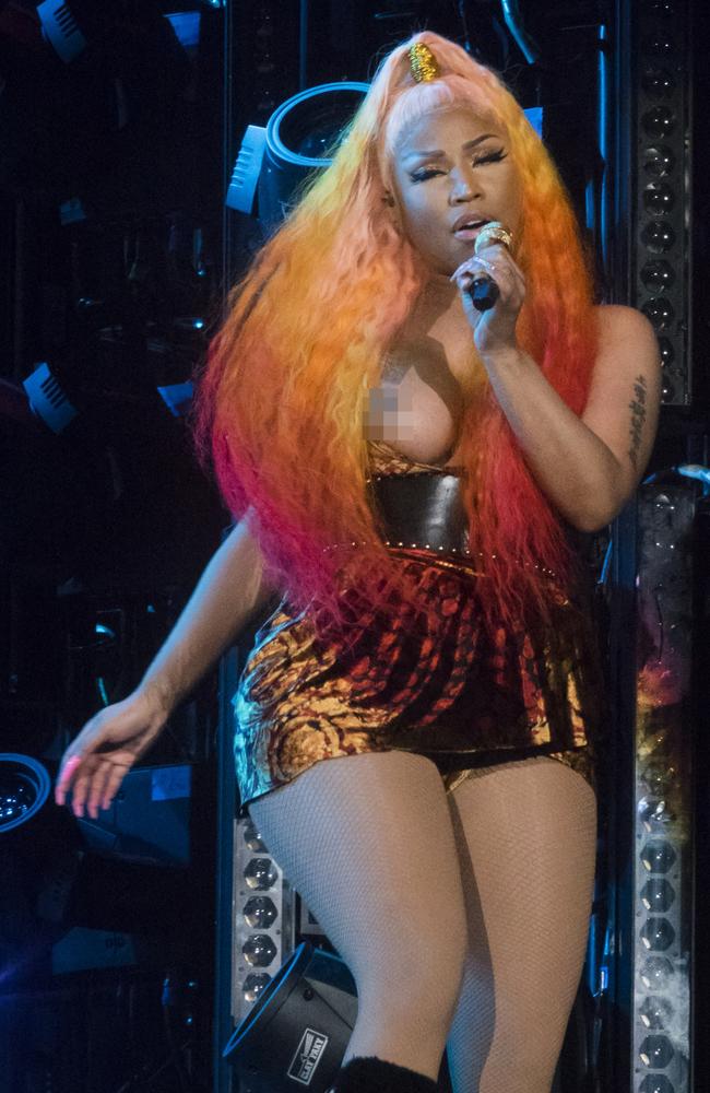 Nicki Minaj pops out of her dress and suffers wardrobe malfunction