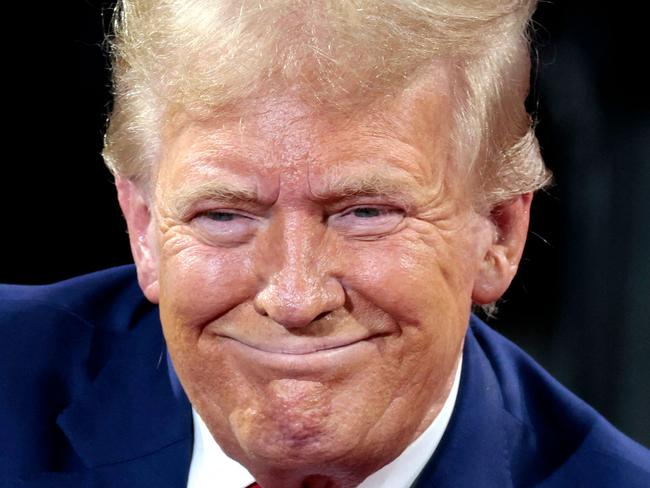 Former US President and Republican presidential candidate Donald Trump attends a town hall meeting moderated by Arkansas Governor Sarah Huckabee Sanders at the Dort Financial Center in Flint, Michigan, on September 17, 2024. (Photo by JEFF KOWALSKY / AFP)