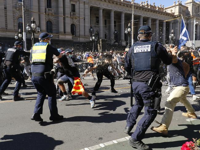 Police used pepper spray to subdue the rowdy protesters. Picture: Maxtrix Media Group