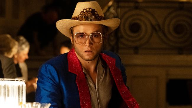 Taron Egerton as Elton John in a scene from Rocketman.