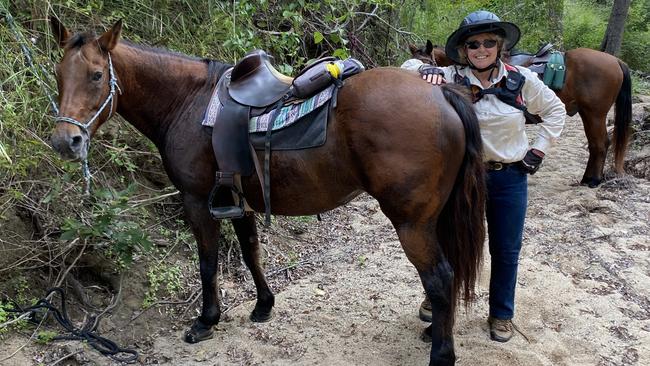 Breakaway Horse Riders Mackay president Roxy Aprile and Slippery take a break at a Mia Mia weekend camp. Picture: Contributed