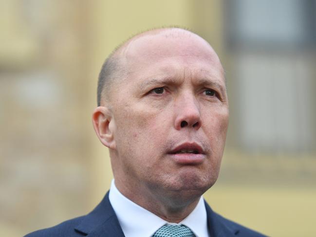 Minister for Immigration Peter Dutton speaks to the media at Mt Lofty House in Crafers, Adelaide, Tuesday, July 24, 2018. Peter Dutton is with Georgina Downer campaigning in the lead up to the Mayo By-election on Saturday. (AAP Image/David Mariuz) NO ARCHIVING