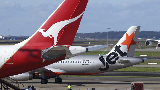 Paper boarding passes are soon to go on Qantas and Jetstar flights. Picture: EPA/Barbara Walton