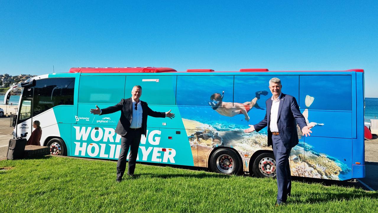 Assistant Tourism Minister Michael Healy and Tourism Minister Stirling Hinchliffe at Bondi Beach for the launch of a new campaign to bring working holiday-makers to Queensland. Picture: supplied